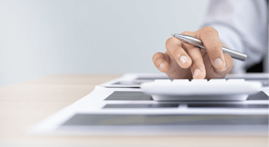 person using a white calculator