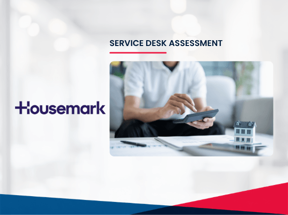 A person uses a tablet at a desk with documents and a model house, representing the Service Desk Assessment and its impact on customer experience. The text reads Housemark and Service Desk Assessment. The background is blurred with abstract blue and red shapes at the bottom.