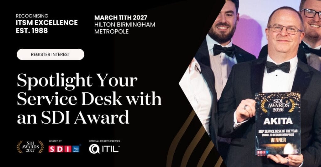 A smiling man in a suit holds an SDI award trophy on stage, promoting IT service desk excellence at Hilton Birmingham Metropole on 11 March 2027.