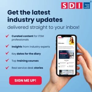 A hand holds a smartphone displaying an email newsletter. Text advertises SDI’s industry updates, including curated content, insights, key dates, and how to Build the Business Case for Service Desk Certification. A red Sign Me Up! button appears at the bottom.